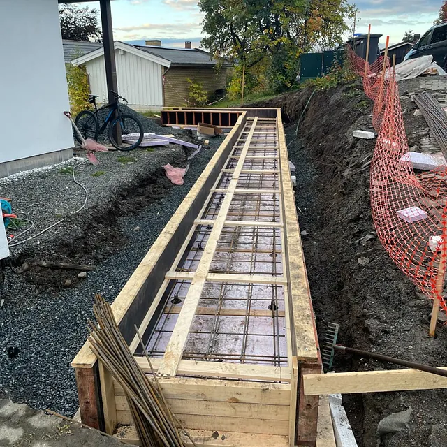 Prosjektbilde: Støttemurer og garasje på Gjøvik